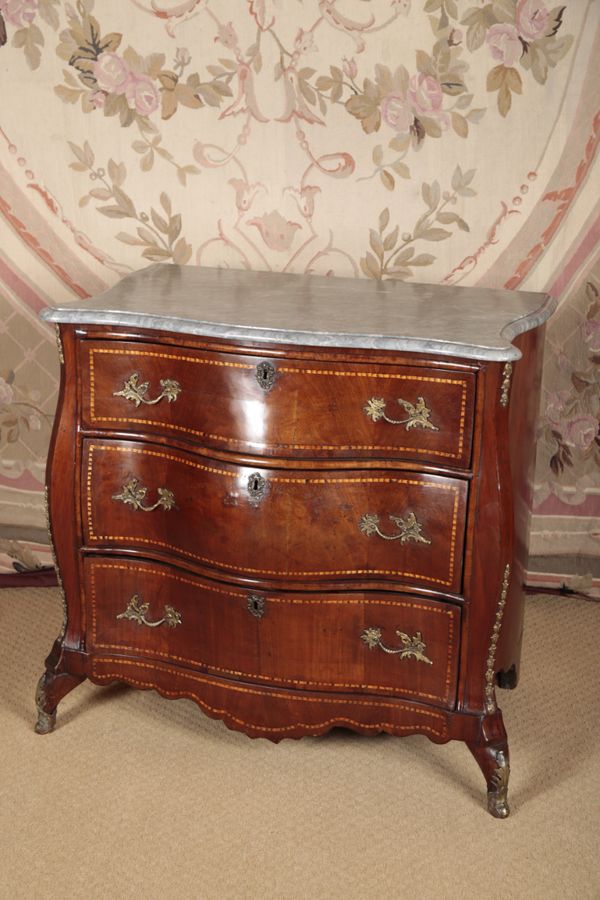 A DUTCH WALNUT BOMBE COMMODE