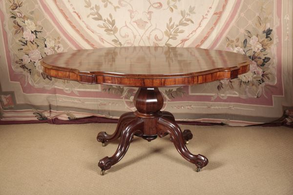 A VICTORIAN ROSEWOOD CENTRE TABLE