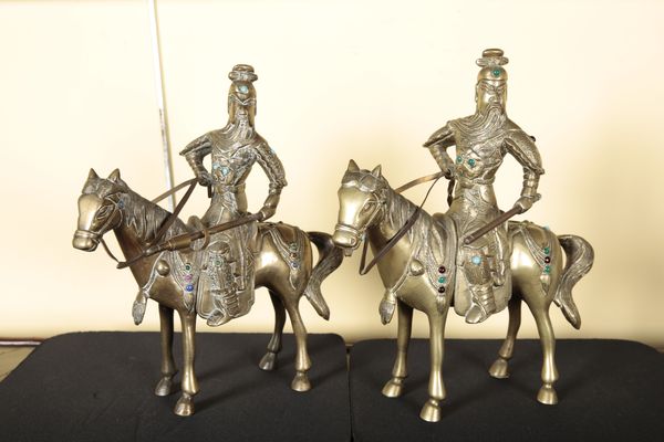 A PAIR OF CHINESE BRONZE FIGURES OF HORSES AND RIDERS