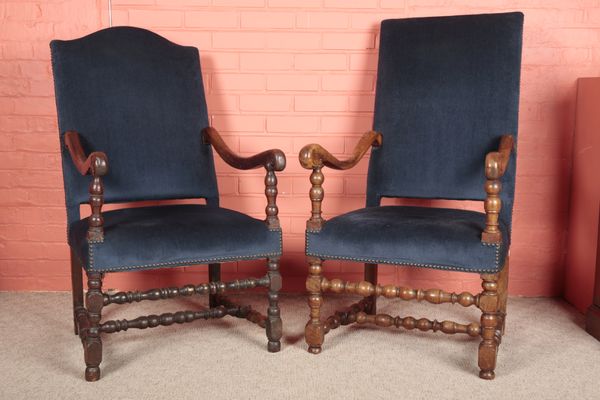 A NEAR PAIR OF LOUIS XVI WALNUT FAUTEUILS