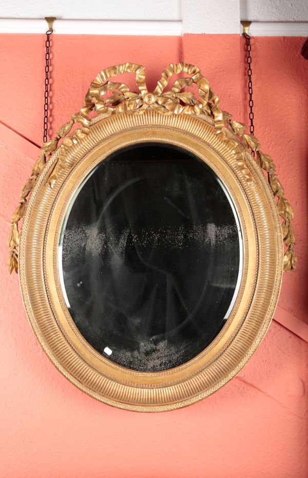 A LOUIS XVI STYLE GILTWOOD MIRROR