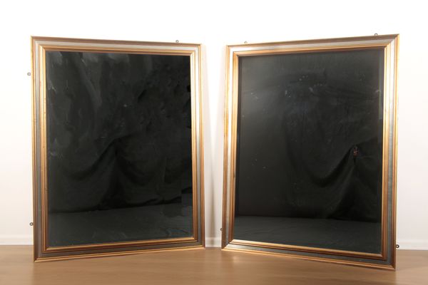 A PAIR OF GILT RECTANGULAR MIRRORS