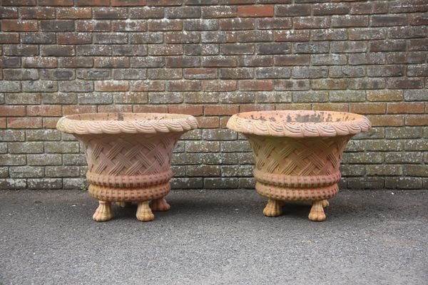 A PAIR OF LARGE BASKETWEAVE TERRACOTTA FLARED PLANTERS