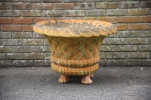 A LARGE BASKETWEAVE TERRACOTTA FLARED PLANTER