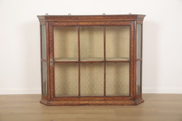 A DUTCH WALNUT AND MARQUETRY INLAID WALL CABINET