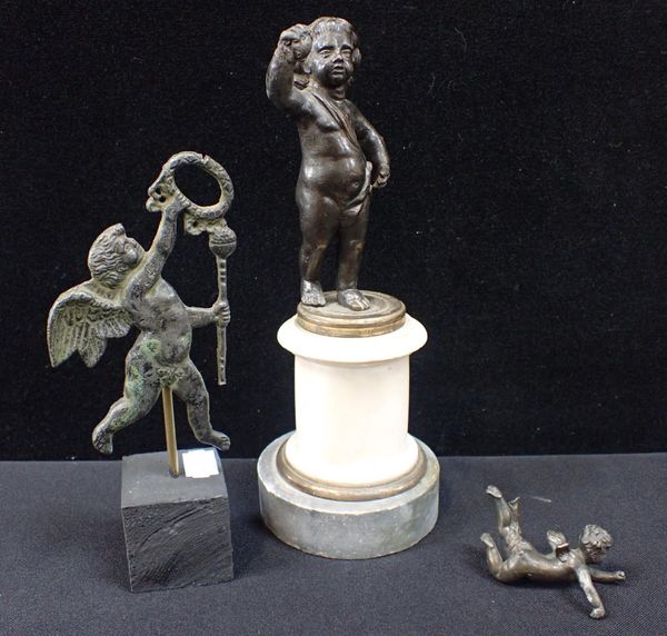 A FRENCH BRONZE PUTTI ON MARBLE PLINTH