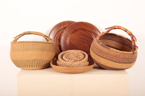 A QUANTITY OF NORTH AFRICAN STYLE WOVEN BASKETS