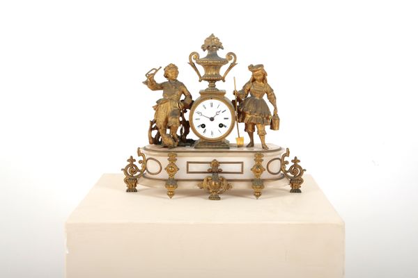 A 19TH CENTURY FRENCH GILT SPELTER MANTEL CLOCK