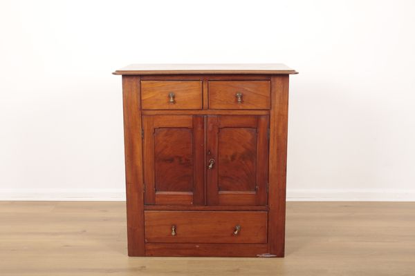 A SMALL MAHOGANY CABINET