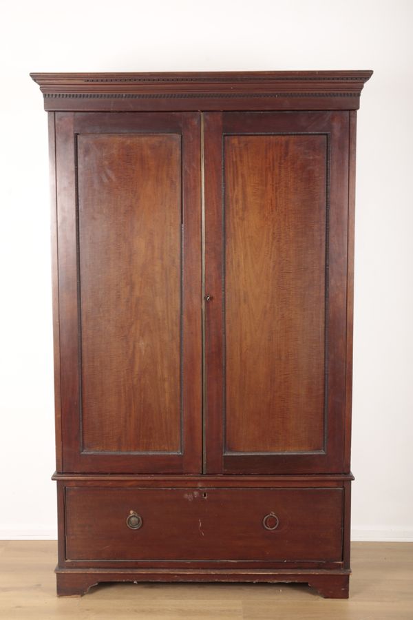 A 19TH CENTURY MAHOGANY LINEN PRESS