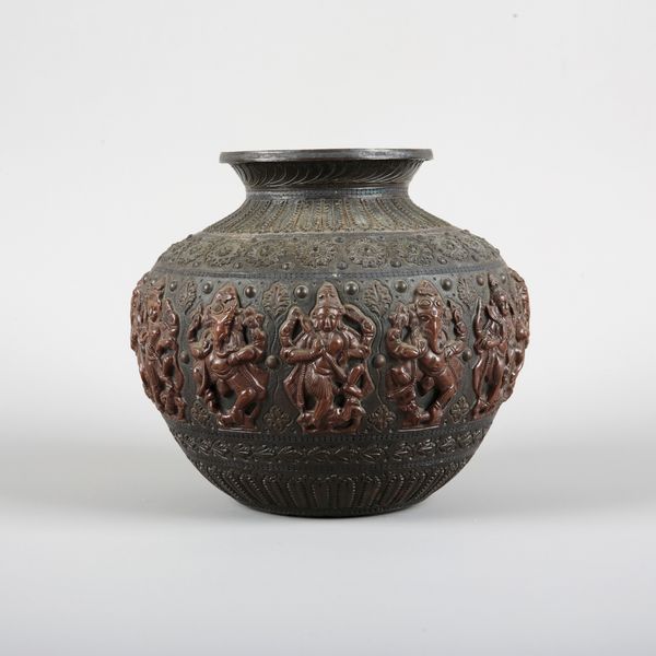 AN INDIAN TANJORE BRONZE AND COPPER INLAID LOTA VESSEL