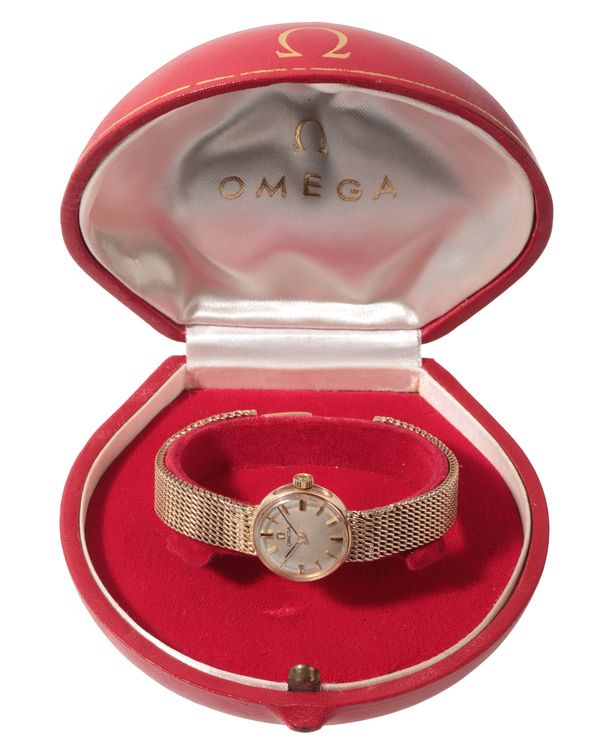 OMEGA: A LADY'S 9CT GOLD BRACELET WATCH