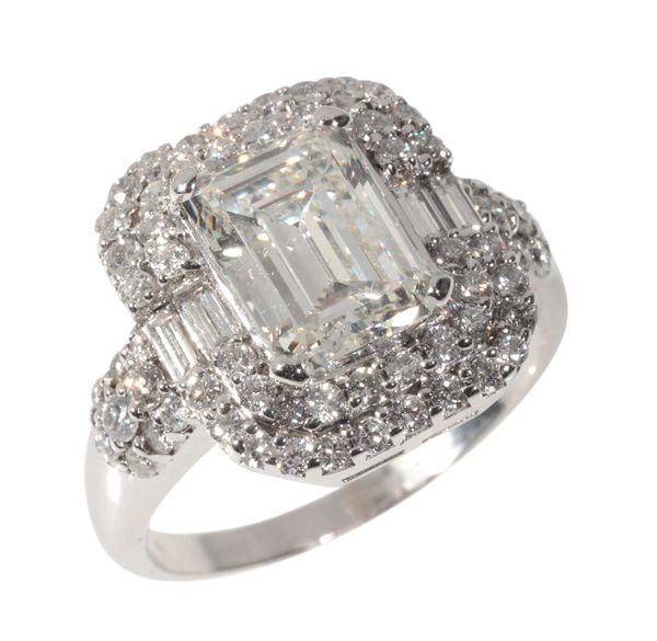 A 3.10 CARAT EMERALD CUT DIAMOND RING