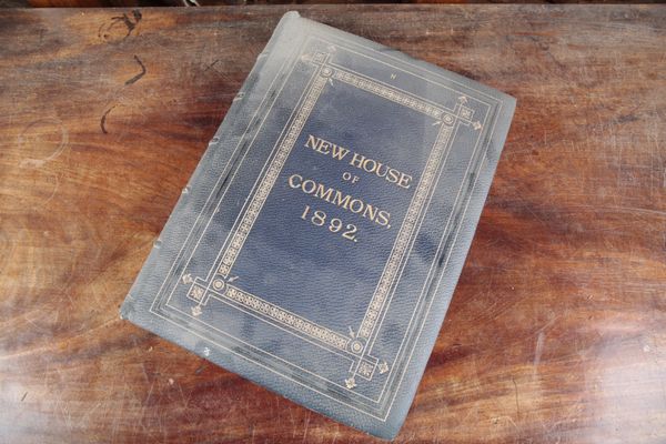 A BLUE LEATHER BOUND ALBUM TITLED ‘NEW HOUSE OF COMMONS 1892’