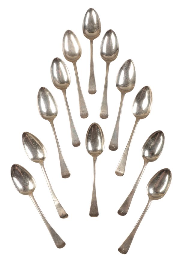 A SET OF TWELVE GEORGE III SILVER OLD ENGLISH PATTERN DESSERT SPOONS