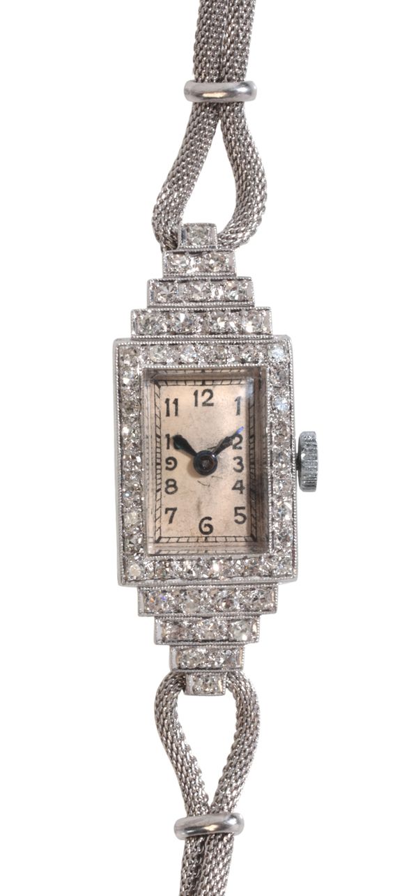 A LADY'S PLATINUM AND DIAMOND COCKTAIL WATCH