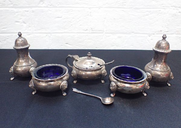 A SILVER CRUET SET, WITH LION MASK AND PAW  FEET