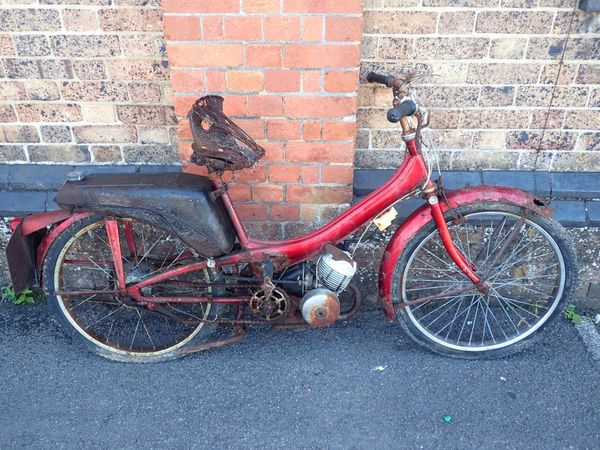 A RALEIGH RUNABOUT MOTORCYCLE