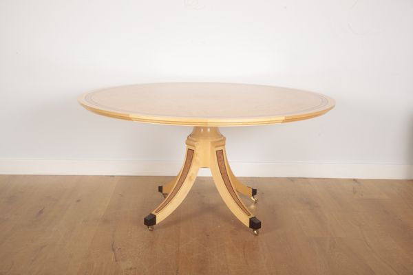 LINLEY: A SYCAMORE AND BURR ASH DINING TABLE