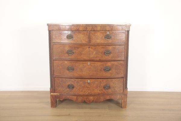 A GEORGE IV FIGURED MAHOGANY BOW FRONT CHEST OF DRAWERS