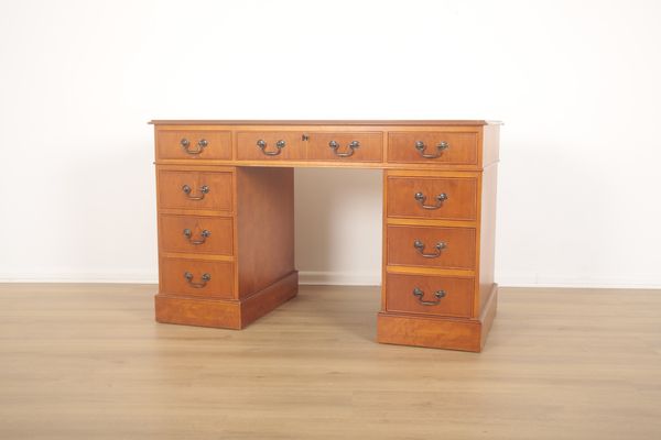 A YEW WOOD PEDESTAL DESK