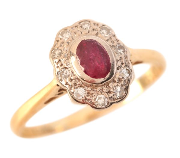 A RUBY AND DIAMOND CLUSTER RING