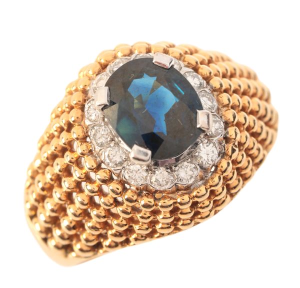 A SAPPHIRE AND DIAMOND BOMBÉ RING