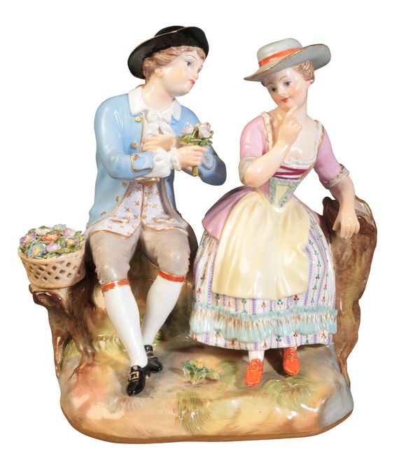 A MEISSEN PORCELAIN FIGURE OF A COURTING COUPLE