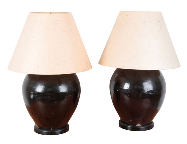 A PAIR OF LARGE BLACK GLAZED CERAMIC LAMPS