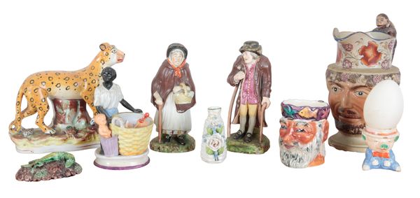 TWO STAFFORDSHIRE PEARLWARE 'OLD AGE' FIGURES