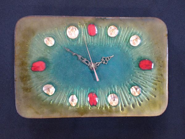 A MODERNIST ENAMELLED WALL CLOCK