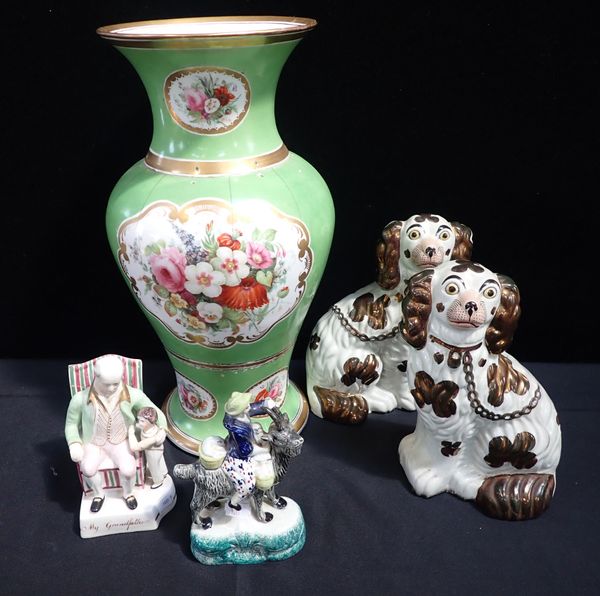 A PAIR OF LUSTRE STAFFORDSHIRE DOGS