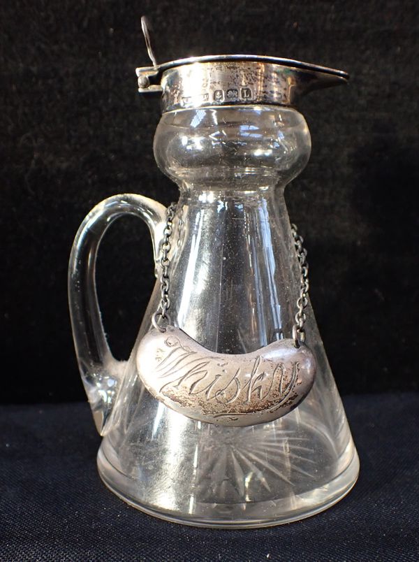 A SILVER-MOUNTED WHISKY TOT