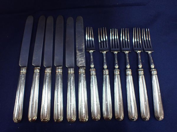 A MATCHED SILVER FRUIT EATING SET