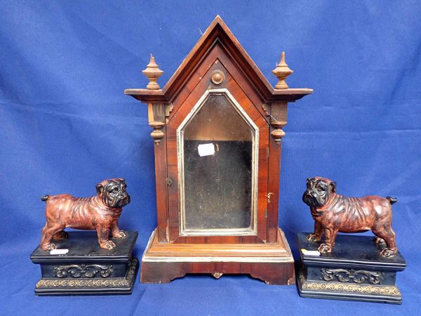 A PAIR OF DECORATIVE PUGS