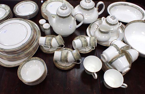 A ROYAL DOULTON 'ISABELLA' DINNER SERVICE