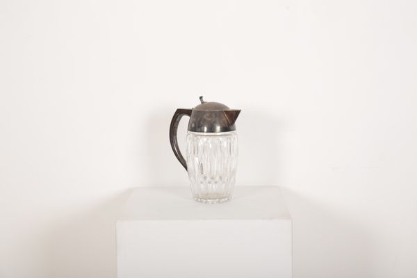 A SILVER MOUNTED JUG BY WILKENS OF HAMBURG