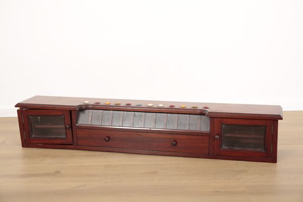 A SNOOKER/BILLIARDS WALL HANGING BALL STORAGE COMPARTMENT