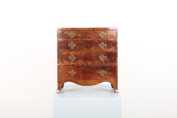 A GEORGE III STYLE MAHOGANY MINIATURE BOWFRONT CHEST OR APPRENTICE PIECE