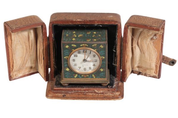 ZENITH: A GILT METAL AND ENAMEL TRAVELLING CLOCK