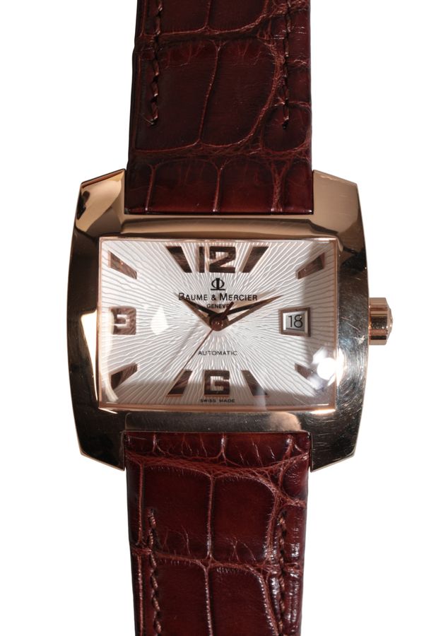 SOLD BY PRIVATE TREATY SALE :  BAUME & MERCIER: A GENTLEMAN'S 18CT GOLD WRISTWATCH