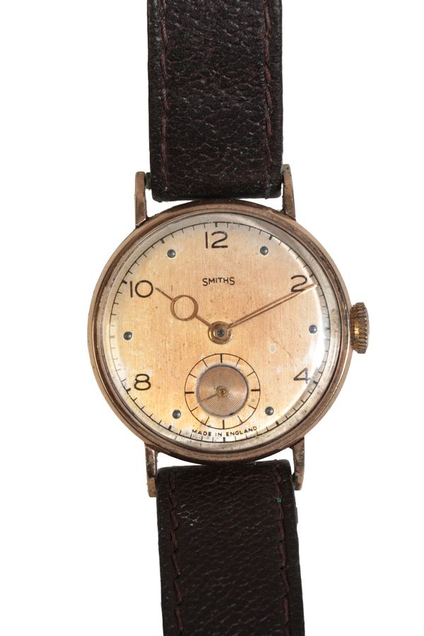 SMITHS: A GENTLEMAN'S 9CT GOLD WRISTWATCH