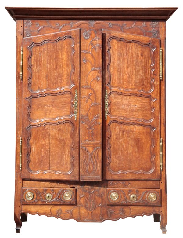 A CONTINENTAL OAK ARMOIRE