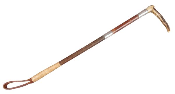 A LADY'S LEATHER RIDING CROP