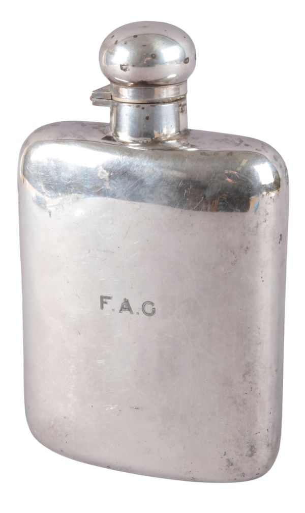 A LARGE SILVER-PLATED HIP FLASK