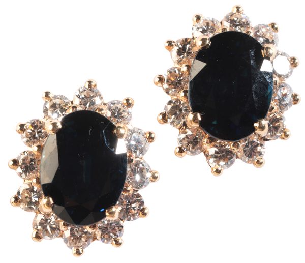 A PAIR OF SAPPHIRE AND DIAMOND CLUSTER EARRINGS