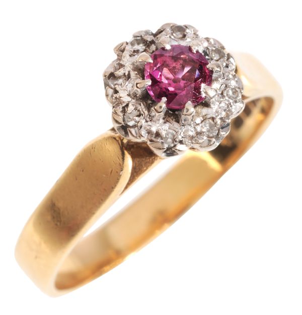 A RUBY AND DIAMOND CLUSTER RING