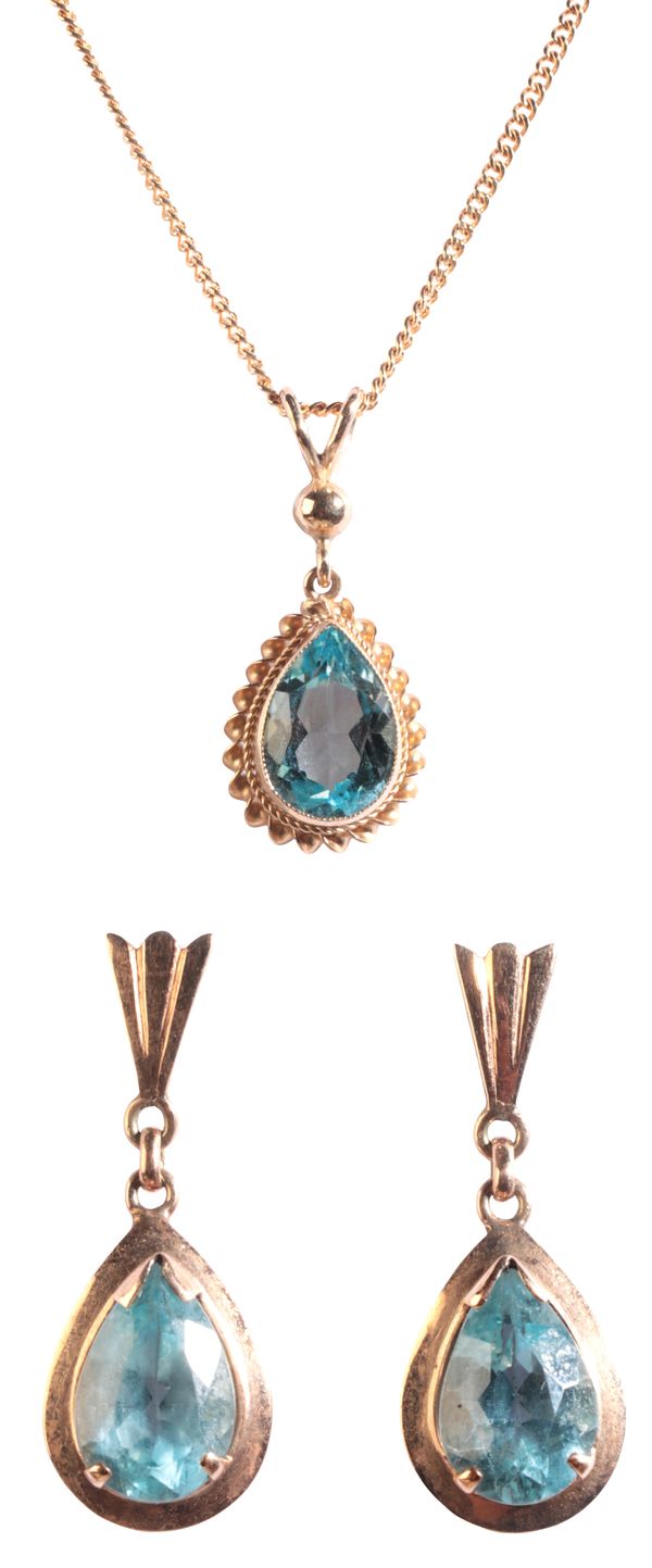 A TOPAZ PENDANT NECKLACE AND EARRING SUITE