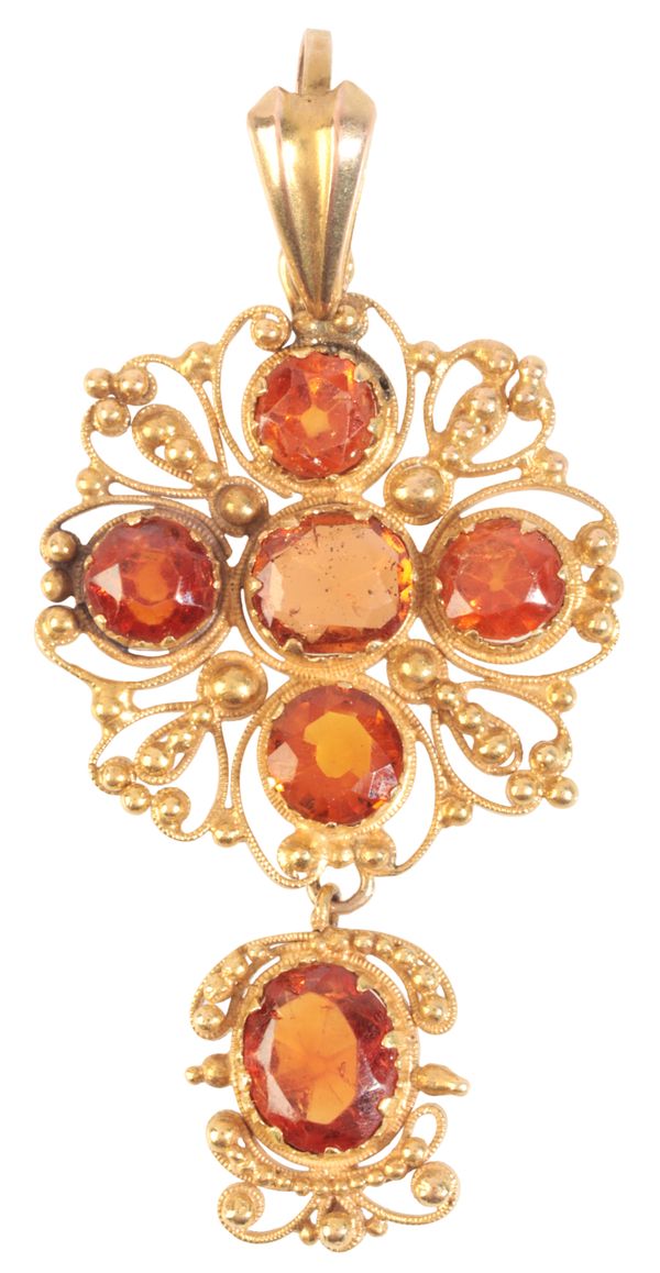 A HESSONITE GARNET PENDANT