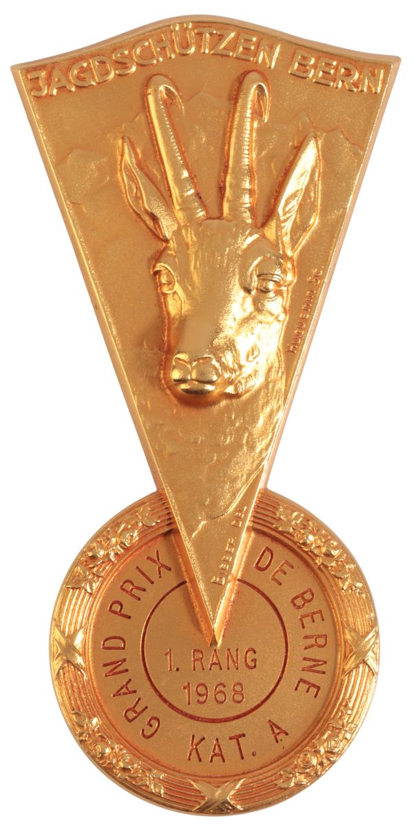 AN 18CT GOLD SWISS SHOOTING MEDAL